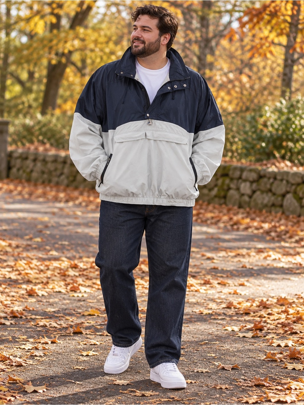 Vintage K-Way two-tone anorak in navy blue and light gray/off-white. Features a